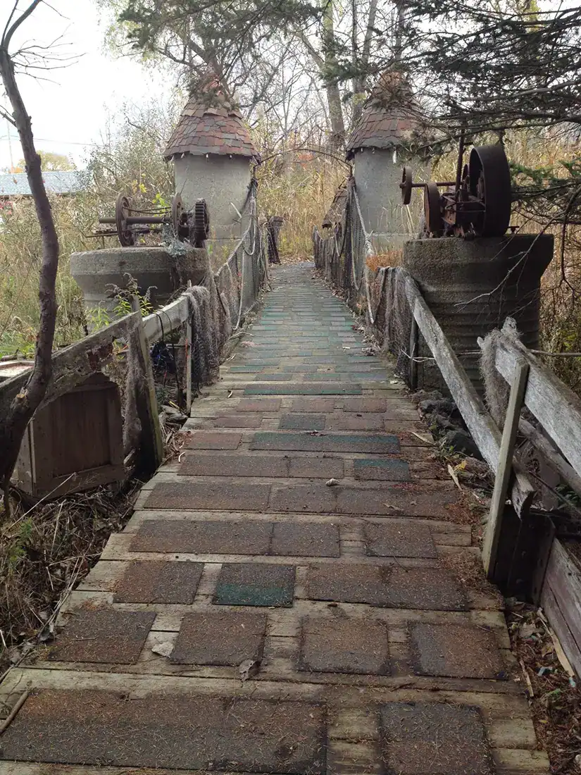 Peter Wing created his Haunted Fortress from recycled objects, such as the cast-off machinery parts holding up the bridge over the Bottomless Pit. (Photo supplied)